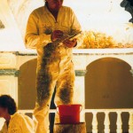 Rainer Maria Latzke while painting the entrance of a historic villa in Antalya, Turkey